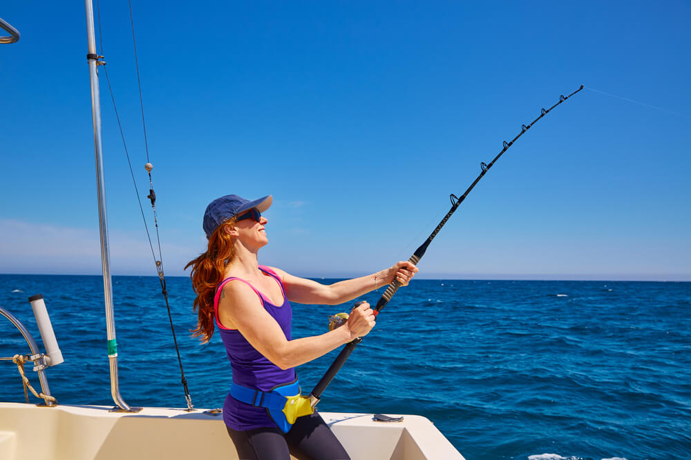 A woman fishing in Nassau, Bahamas.