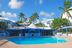 Before exploring the nightlife in Nassau, relax by the pool at your Bahamas resort.
