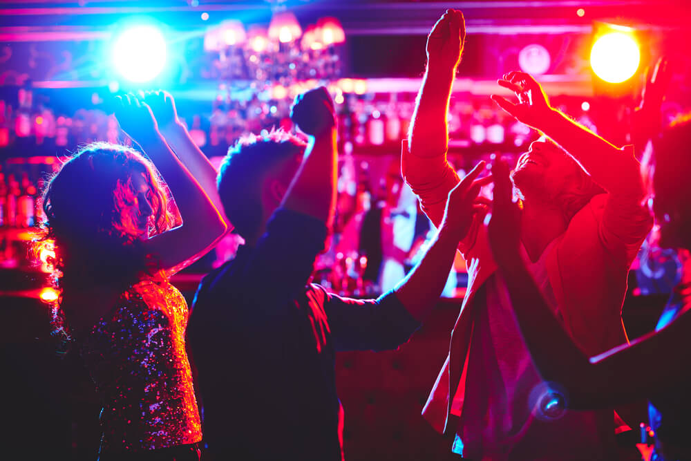 A group enjoying Nassau, Bahamas, nightlife scene.