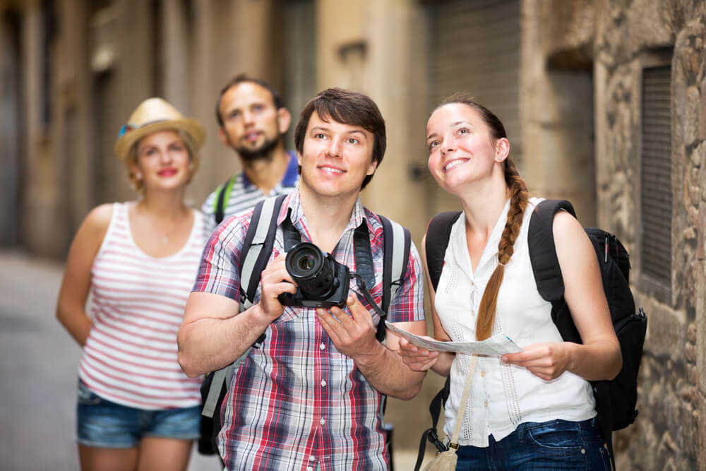 People on a walking tour learning the history of Nassau.