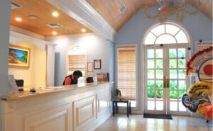 The front desk and lobby area of a Nassau resort to look up "water activities near me" in.