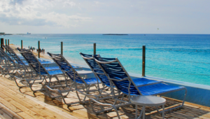 Chairs on a Nassau resort's beachfront deck to relax on after looking for shells in the Bahamas. 