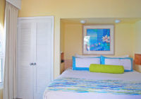 The bedroom of a Bahamas villa to relax in after exploring things to do on Paradise Island.